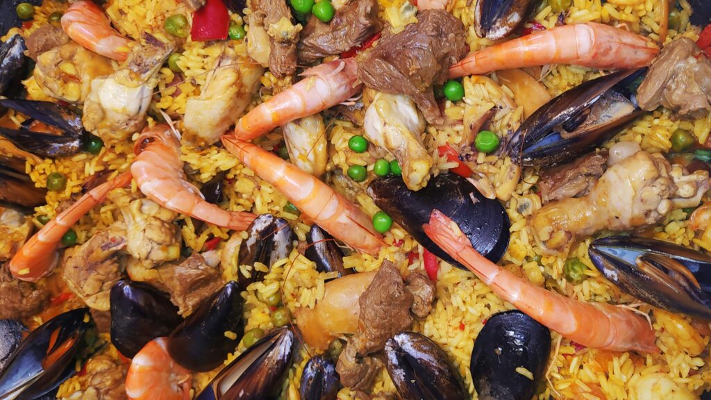 Traditional Spanish paella with saffron rice
