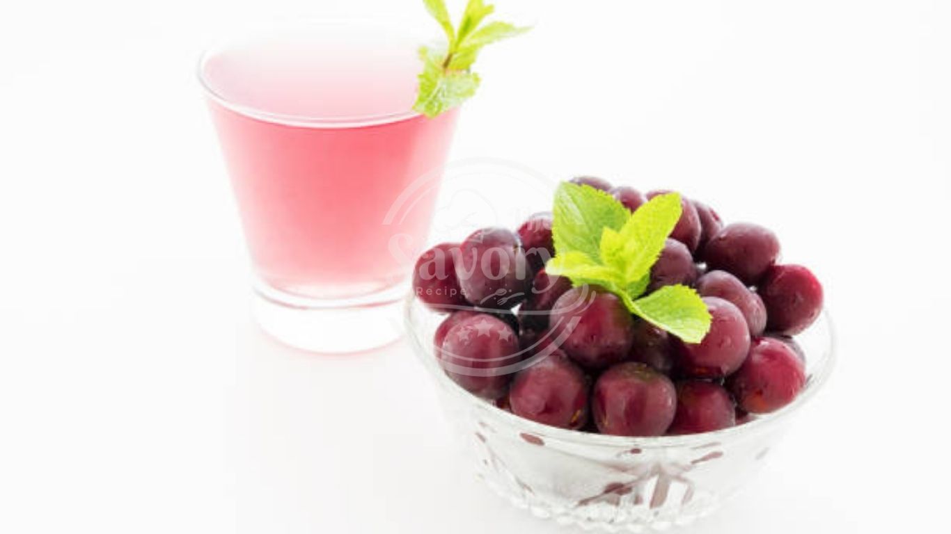 Grape juice tonic with garnishes